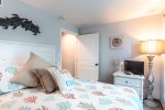Guest bedroom with queen bed and cable television